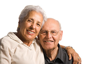Photo of a couple smiling.